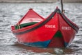 Detailed view of a traditional fishing boat on beach in lagoon on Nazare, in Portugal