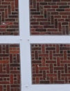 Detailed view of a wall from a rural half-timbered house in the old country near Hamburg, eed bricks, white joints and wooden Royalty Free Stock Photo