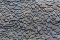 Detailed view of wall texture randomly lined with slate panels, typical and traditional shale stone material Royalty Free Stock Photo