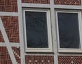 Detailed view of a wall with window from a rural half-timbered house in the old country near Hamburg, red bricks, white joints and Royalty Free Stock Photo