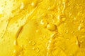 A detailed view of water droplets on a yellow background surface Royalty Free Stock Photo