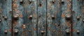 Close-Up of Weathered Wooden Door With Metal Knobs Royalty Free Stock Photo