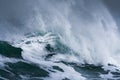 Detailed winter storm wave breaking and splashing on shore Royalty Free Stock Photo