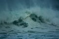 Detailed winter storm wave breaking and splashing on shore Royalty Free Stock Photo