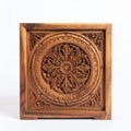Detailed Wood Carving with Intricate Floral Pattern on Square Panel in Studio Shot Royalty Free Stock Photo
