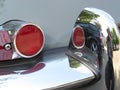 Details of backlight and bumper of an Old Classic English car Jaguar E-Type Royalty Free Stock Photo