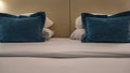 Details of the bedroom interior. Double bed with white sheets