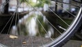 Details of bicycle wheel at Amsterdam canal, Autumn, Netherlands Royalty Free Stock Photo