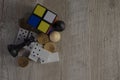 Details of board games, dominoes, dice, chess on a light and wooden background.