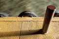 Details of boat service pier with wavy water for background Royalty Free Stock Photo