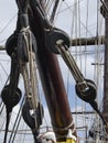 Details of bowsprit and pulleys on board vintage sailing ship. Royalty Free Stock Photo