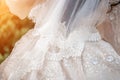 Details of the bride dress fabric and beautiful embroidery wedding concept used as a background for illustrations and Royalty Free Stock Photo