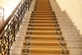 Details of brown carpeted staircase