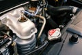 Details of car engine, car radiator cap Royalty Free Stock Photo