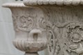 Details of carved stone flowerpots reliefs