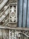 Details of the Carved wooden facade of the old house. House with carved wooden architraves, Russia, southern Urals Royalty Free Stock Photo