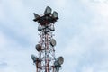 Cellular base station against cloudy sky Royalty Free Stock Photo