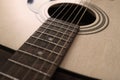 Details of classic acoustic guitar, strings and chords, guitar neck close up Royalty Free Stock Photo