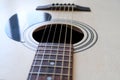 Details of classic acoustic guitar, strings and chords, guitar neck close up Royalty Free Stock Photo