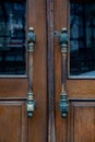 Details of classic architecture building entrance. Doorknob closeup Royalty Free Stock Photo