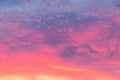 Details of clouds at sunset with dark orange, pink, and blueish purple tones Royalty Free Stock Photo