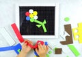 Details of a colorful children`s constructor, colorful mosaic, an educational game for preschoolers. Colorful toys , copy space