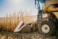 Details of combine harvester working in the fields. Agriculture Farmer working with machinery Royalty Free Stock Photo