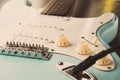 Details and connection of guitar and wire cable jack. Tone and volume controls Royalty Free Stock Photo
