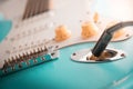 Details and connection of guitar and wire cable jack. Tone and volume controls Royalty Free Stock Photo