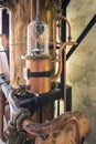 Details of copper tools used to distil schnapps. Royalty Free Stock Photo