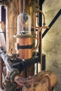 Details of copper tools used to distil schnapps. Royalty Free Stock Photo