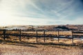 Details of countryroad in mountains, wooden fence on a cold winter day Royalty Free Stock Photo