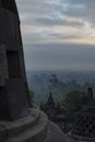 Details of a dark sunrise between the stupas of the Borobudur temple, Indonesia