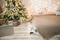 Details of the decorated New Year`s interior. Scandinavian living room and kitchen for Christmas. The comfort of homely rustic dec Royalty Free Stock Photo