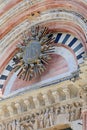 Details of doorway in marble on the facade of the Siena Baptistery Royalty Free Stock Photo