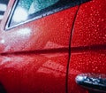 Details of electric car. Door handle and rain drops. Royalty Free Stock Photo