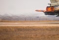 Details with the exhausts of a military jet fighter plane engine while taking off from a tarmac taxiway Royalty Free Stock Photo