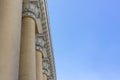 Details of the exterior architecture of the building against the blue sky. Royalty Free Stock Photo