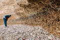 Details of the geological formation of layers on the seashore. The layer consists of shells and sand Royalty Free Stock Photo