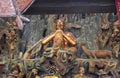 Golden Statue of Guanyin and Sudhana acompanied by their masters from the Jade Buddha Temple interior in Shanghai