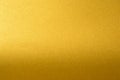 Details of golden texture background with gradient and shadow. Gold color paint wall. Luxury golden background and