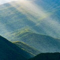 Details of Green Mountain Slopes with Sun Rays