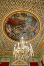 Details of an impressive ceiling painting with a beautiful crystal chandelier in the Museo Nacional de Ceramica, Valencia, Spain