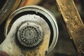 Details with an industrial metal bearing in a dirty and old but still functioning metal works, old fashioned, factory Royalty Free Stock Photo