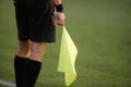 Details of a linesman referee during a soccer game