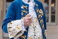 The details of man dressed in a baroque costume