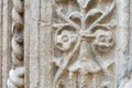 Details of medieval stucco ornament of grey colour on the stone wall in Toledo, Spain