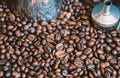 Details of a metal coffee maker in coffee beans Royalty Free Stock Photo