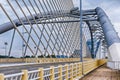 Details of modern architecture - an empty asphalt road on a large bridge.