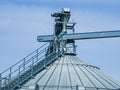 Details of modern granary elevator. Silver silos Royalty Free Stock Photo